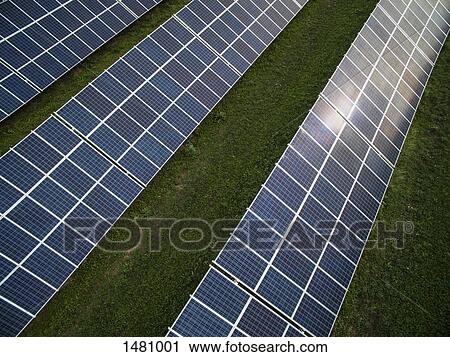 High angle view of solar panels in field View Large Photo Image Stock Image - High angle view of solar panels in field. Fotosearch