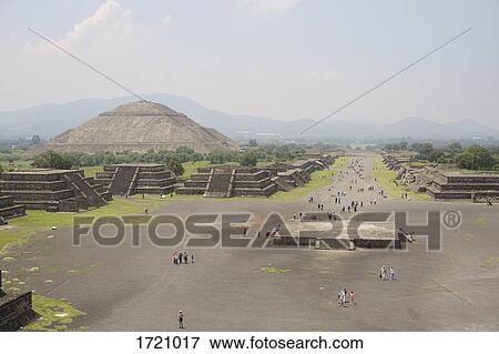 High angle view of tourists visiting pyramids in foggy weather, Teotihuacan, Mexico View Large Photo Image Stock Photo - High angle view of tourists visiting pyramids in foggy weather, Teotihuacan, Mexico. Fotosearch