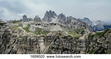 Idyllic shot of rocky landscape against sky, South Tyrol, Italy View Large Photo Image Stock Image - Idyllic shot of rocky landscape against sky, South Tyrol, Italy. Fotosearch
