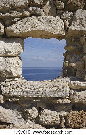 Idyllic, sunny ocean view from stone window, Crete, Greece View Large Photo Image Stock Image - Idyllic, sunny ocean view from stone window, Crete, Greece. Fotosearch