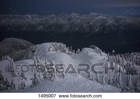 Idyllic view of snowcapped Mount Seymour at dusk, British Columbia, Canada View Large Photo Image Stock Photo - Idyllic view of snowcapped Mount Seymour at dusk, British Columbia, Canada. Fotosearch