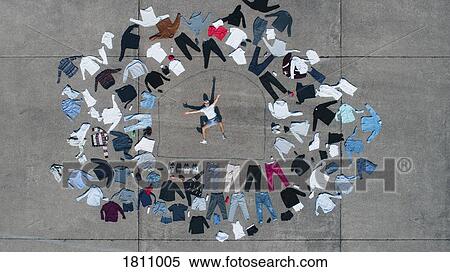 Knolling man surrounded by clothing wardrobe View Large Photo Image Stock Photography - Knolling man surrounded by clothing wardrobe. Fotosearch