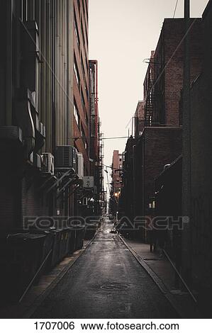 Long alley amidst buildings in city, New York City, New York, USA View Large Photo Image Stock Photograph - Long alley amidst buildings in city, New York City, New York, USA. Fotosearch