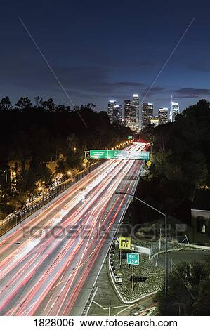 Long exposure cars driving along freeway, Los Angeles, California, USA View Large Photo Image Stock Photograph - Long exposure cars driving along freeway, Los Angeles, California, USA. Fotosearch