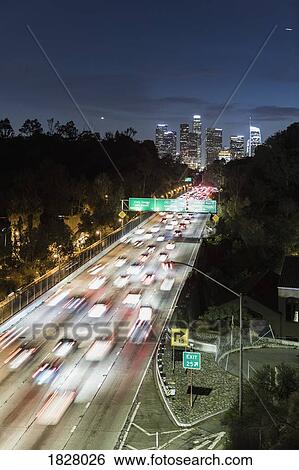 Long exposure cars driving along freeway at night, Los Angeles, California, USA View Large Photo Image Stock Photograph - Long exposure cars driving along freeway at night, Los Angeles, California, USA. Fotosearch
