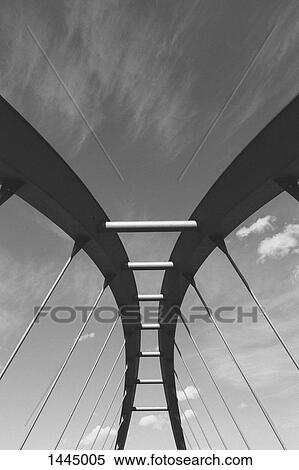 Low angle view of bridge against sky View Large Photo Image Stock Photography - Low angle view of bridge against sky. Fotosearch