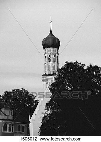 Low angle view of church and tree against sky, Bavaria, Germany View Large Photo Image Stock Image - Low angle view of church and tree against sky, Bavaria, Germany. Fotosearch