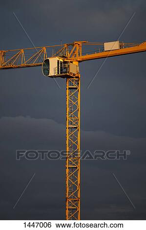 Low angle view of crane against sky at dusk View Large Photo Image Stock Photograph - Low angle view of crane against sky at dusk. Fotosearch