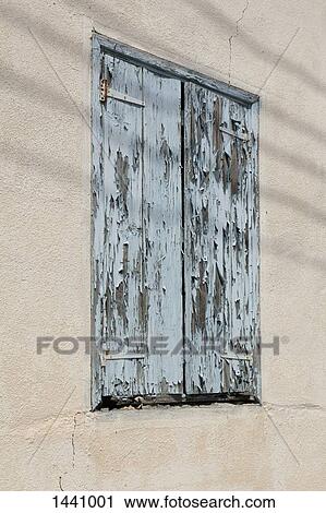 Low angle view of weathered wooden window on building View Large Photo Image Stock Image - Low angle view of weathered wooden window on building. Fotosearch