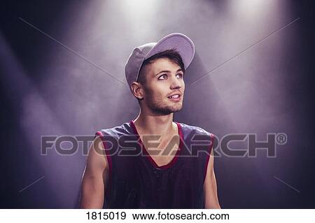 Male modern dancer on stage View Large Photo Image Stock Photo - Male modern dancer on stage. Fotosearch