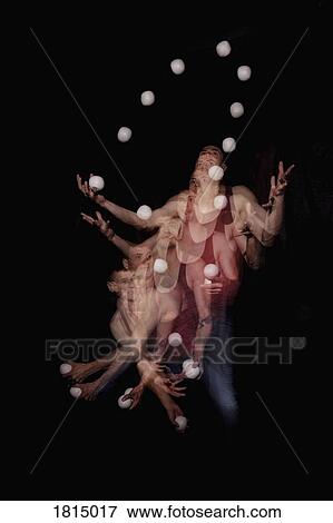 Male performer juggling View Large Photo Image Stock Photo - Male performer juggling. Fotosearch