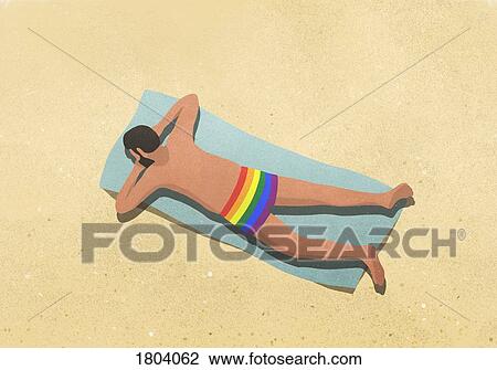 Man in rainbow swim trunks sunbathing on beach View Large Photo Image Stock Image - Man in rainbow swim trunks sunbathing on beach. Fotosearch