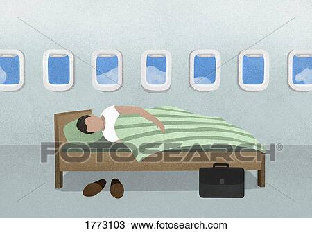 Stock Image - Man sleeping on bed in airplane. Fotosearch