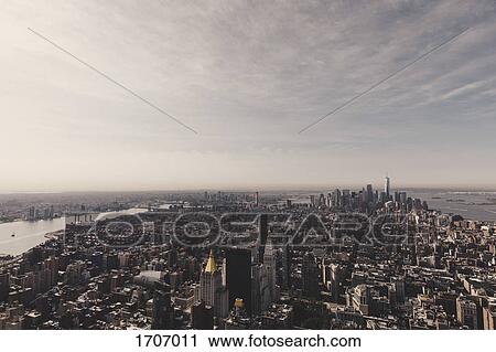 Stock Image - Manhattan against sky during sunset, New York City, New York, USA. Fotosearch