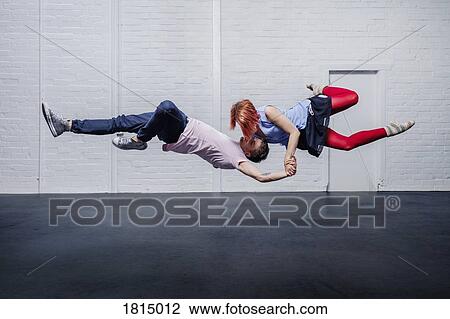 Modern aerial dancers performing View Large Photo Image Stock Image - Modern aerial dancers performing. Fotosearch
