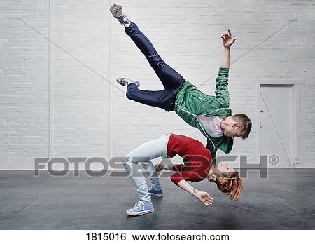 Modern aerialist dancers performing View Large Photo Image Stock Photograph - Modern aerialist dancers performing. Fotosearch