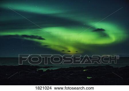 Mysterious Northern Lights over ocean, Reykjanesbaer, Iceland View Large Photo Image Picture - Mysterious Northern Lights over ocean, Reykjanesbaer, Iceland. Fotosearch