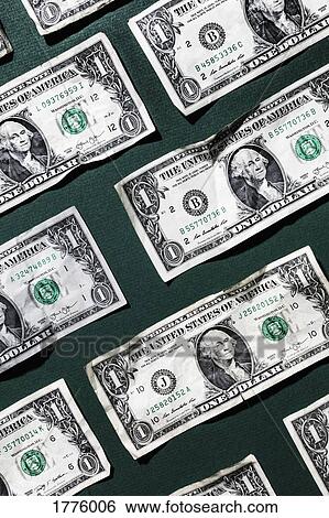 One dollar bills on green background View Large Photo Image Stock Photograph - One dollar bills on green background. Fotosearch