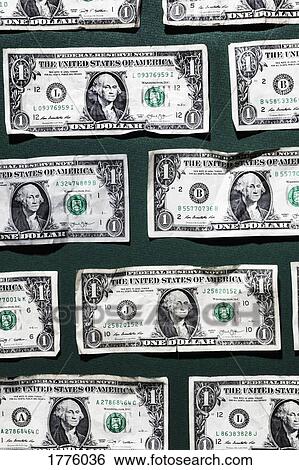 One dollar bills on green background View Large Photo Image Stock Photograph - One dollar bills on green background. Fotosearch