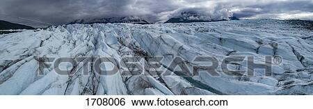 Panoramic view of glacier against cloudy sky, Knik Glacier, Palmer, Alaska, USA View Large Photo Image Stock Photograph - Panoramic view of glacier against cloudy sky, Knik Glacier, Palmer, Alaska, USA. Fotosearch