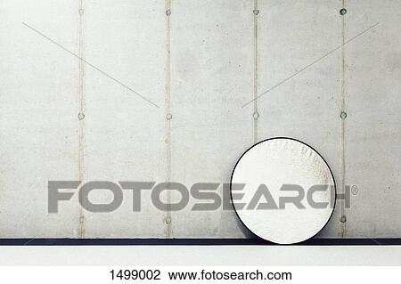 Photographic reflector leaning against a wall View Large Photo Image Stock Image - Photographic reflector leaning against a wall. Fotosearch