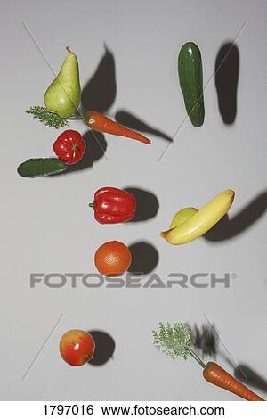 Stock Photograph - Plastic fruits and vegetables on white background. Fotosearch