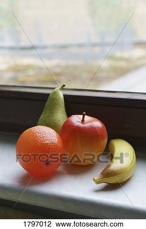 Plastic fruits on windowsill View Large Photo Image Stock Image - Plastic fruits on windowsill. Fotosearch