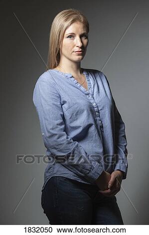 Stock Image - Portrait confident, beautiful woman. Fotosearch