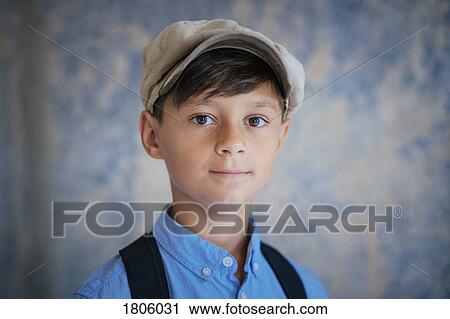Portrait confident boy wearing cap View Large Photo Image Stock Image - Portrait confident boy wearing cap. Fotosearch