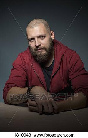 Stock Image - Portrait confident man with beard. Fotosearch