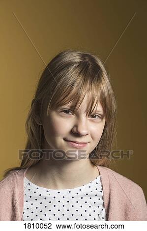 Stock Image - Portrait confident tween girl. Fotosearch