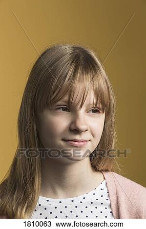 Stock Image - Portrait confident tween girl. Fotosearch