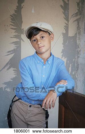 Portrait confident well-dressed boy View Large Photo Image Stock Image - Portrait confident well-dressed boy. Fotosearch