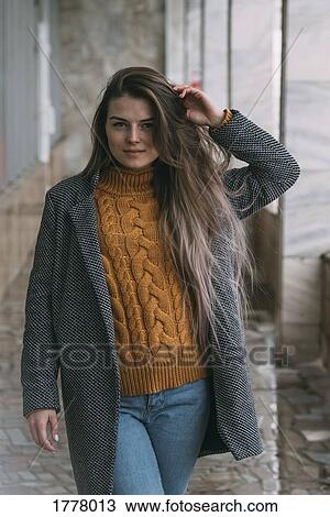 Stock Image - Portrait confident young woman. Fotosearch