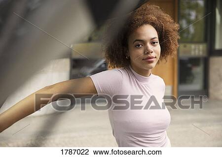 Portrait confident young woman View Large Photo Image Stock Image - Portrait confident young woman. Fotosearch