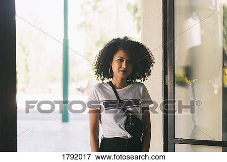 Stock Photo - Portrait confident young woman. Fotosearch