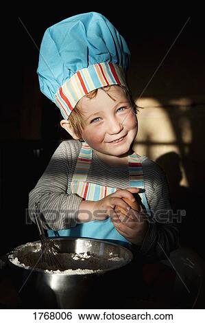 Portrait cute girl in chefs hat baking View Large Photo Image Stock Photograph - Portrait cute girl in chefs hat baking. Fotosearch
