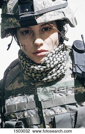 Portrait of army soldier wearing helmet standing against white background View Large Photo Image Stock Image - Portrait of army soldier wearing helmet standing against white background. Fotosearch