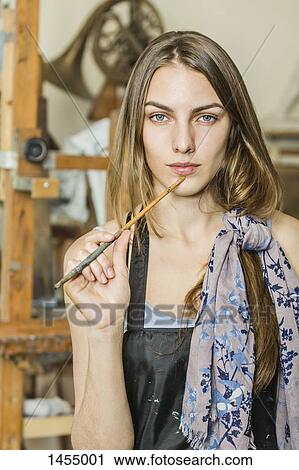 Portrait of confident female painter studio View Large Photo Image Stock Image - Portrait of confident female painter studio. Fotosearch