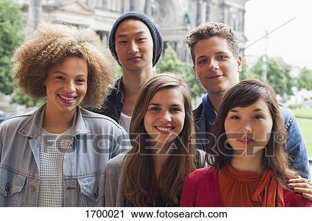 Portrait of smiling multi-ethnic friends standing against Berlin Cathedral, Germany View Large Photo Image Stock Image - Portrait of smiling multi-ethnic friends standing against Berlin Cathedral, Germany. Fotosearch