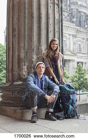 Portrait of smiling young friends by column at Altes Museum, Berlin, Germany View Large Photo Image Stock Photograph - Portrait of smiling young friends by column at Altes Museum, Berlin, Germany. Fotosearch