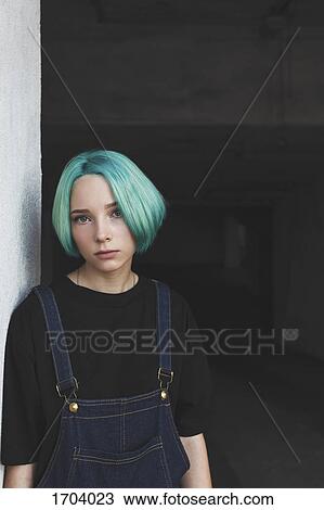 Portrait of teenage girl leaning on wall at basement View Large Photo Image Stock Image - Portrait of teenage girl leaning on wall at basement. Fotosearch