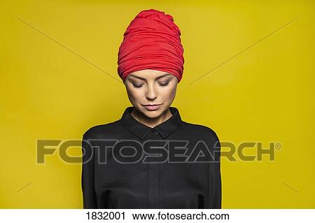 Portrait serene woman wearing headscarf View Large Photo Image Stock Image - Portrait serene woman wearing headscarf. Fotosearch