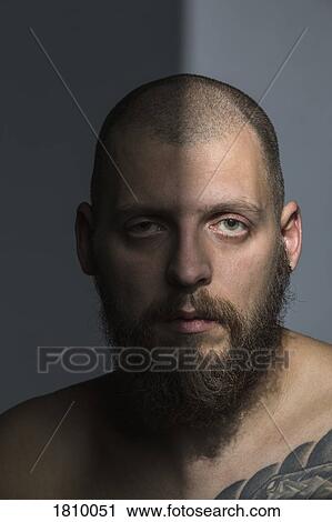 Portrait serious man with beard View Large Photo Image Stock Image - Portrait serious man with beard. Fotosearch