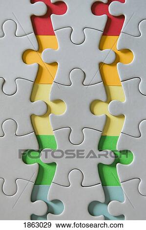 Rainbow edges of disconnected jigsaw puzzle pieces View Large Photo Image Stock Photo - Rainbow edges of disconnected jigsaw puzzle pieces. Fotosearch