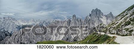 Scenic panoramic view rugged mountain peaks, Drei Zinnen Nature Park, South Tyrol, Italy View Large Photo Image Stock Image - Scenic panoramic view rugged mountain peaks, Drei Zinnen Nature Park, South Tyrol, Italy. Fotosearch