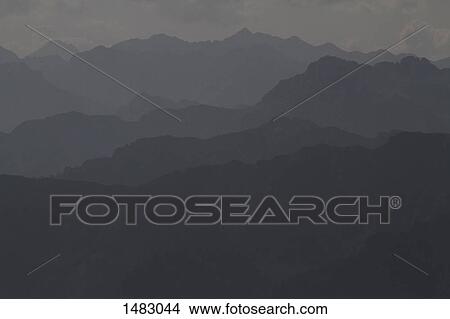 Scenic view of mountain range in foggy weather View Large Photo Image Picture - Scenic view of mountain range in foggy weather. Fotosearch