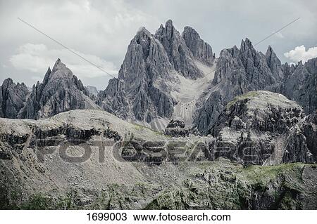 Scenic view of rocky mountains against sky, South Tyrol, Italy View Large Photo Image Stock Image - Scenic view of rocky mountains against sky, South Tyrol, Italy. Fotosearch