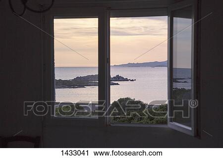 Scenic view of sea seen from window View Large Photo Image Stock Image - Scenic view of sea seen from window. Fotosearch