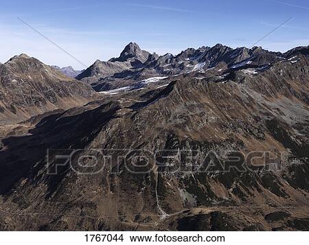 Scenic view rugged brown mountain range, Ischgl, Tyrol, Austria View Large Photo Image Picture - Scenic view rugged brown mountain range, Ischgl, Tyrol, Austria. Fotosearch